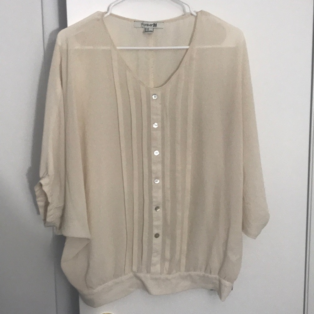 Sheer cream top